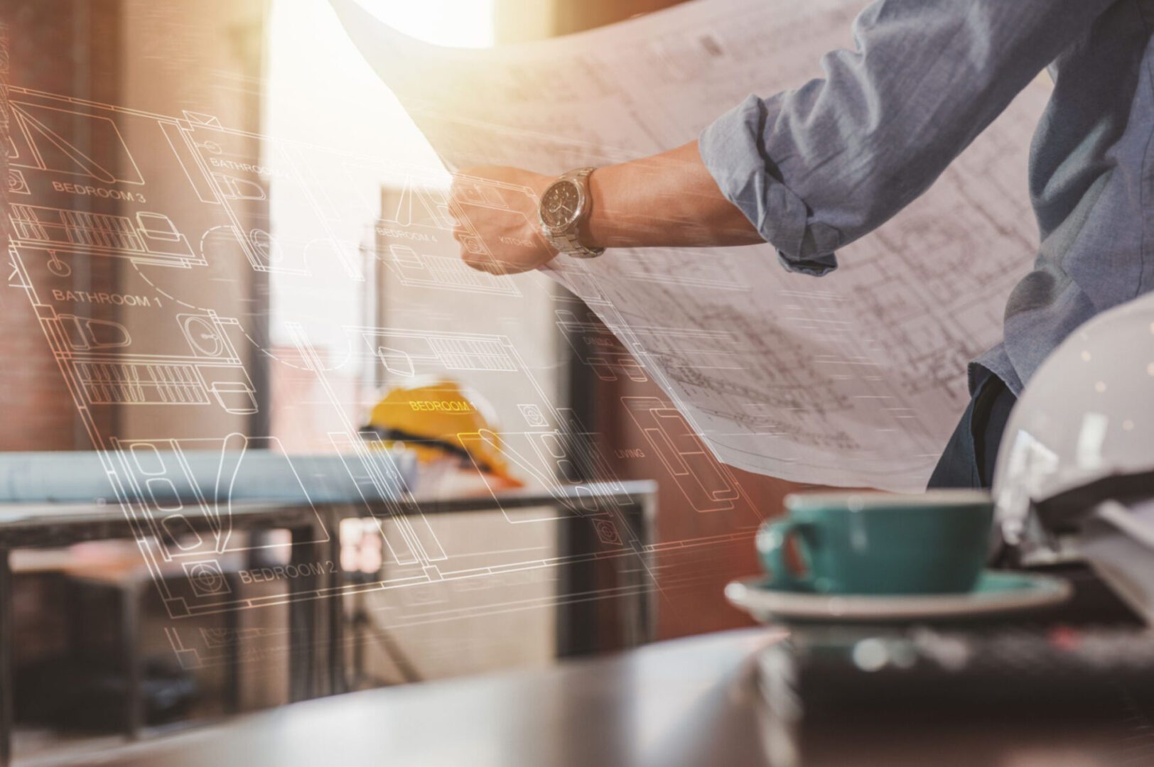 Architect reviewing blueprint in office setting.