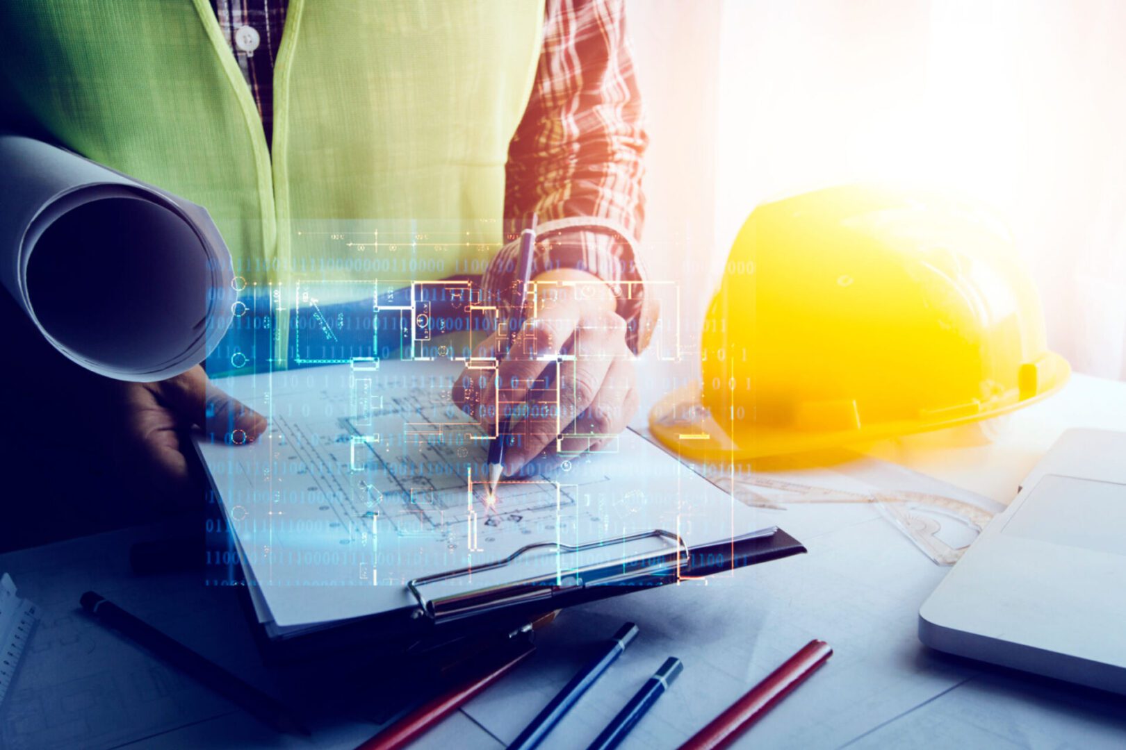 Architect working on blueprint with hard hat.